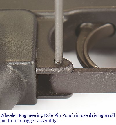 Wheeler Engineering Roll Pin Punch driving a roll pin from a trigger assembly
