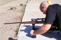 Adjusting shooting stand with Ruger .243 rifle installed