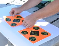 Applying Caldwell Orange Peel Targets to the target backer Applying Caldwell Orange Peel Targets to the target backer